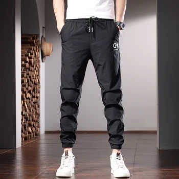 Летни мъжки спортни ежедневни панталони са Модерни черни, с писмото принтом, дебнещ леки панталони-джоггеры с еластичен ластик на талията